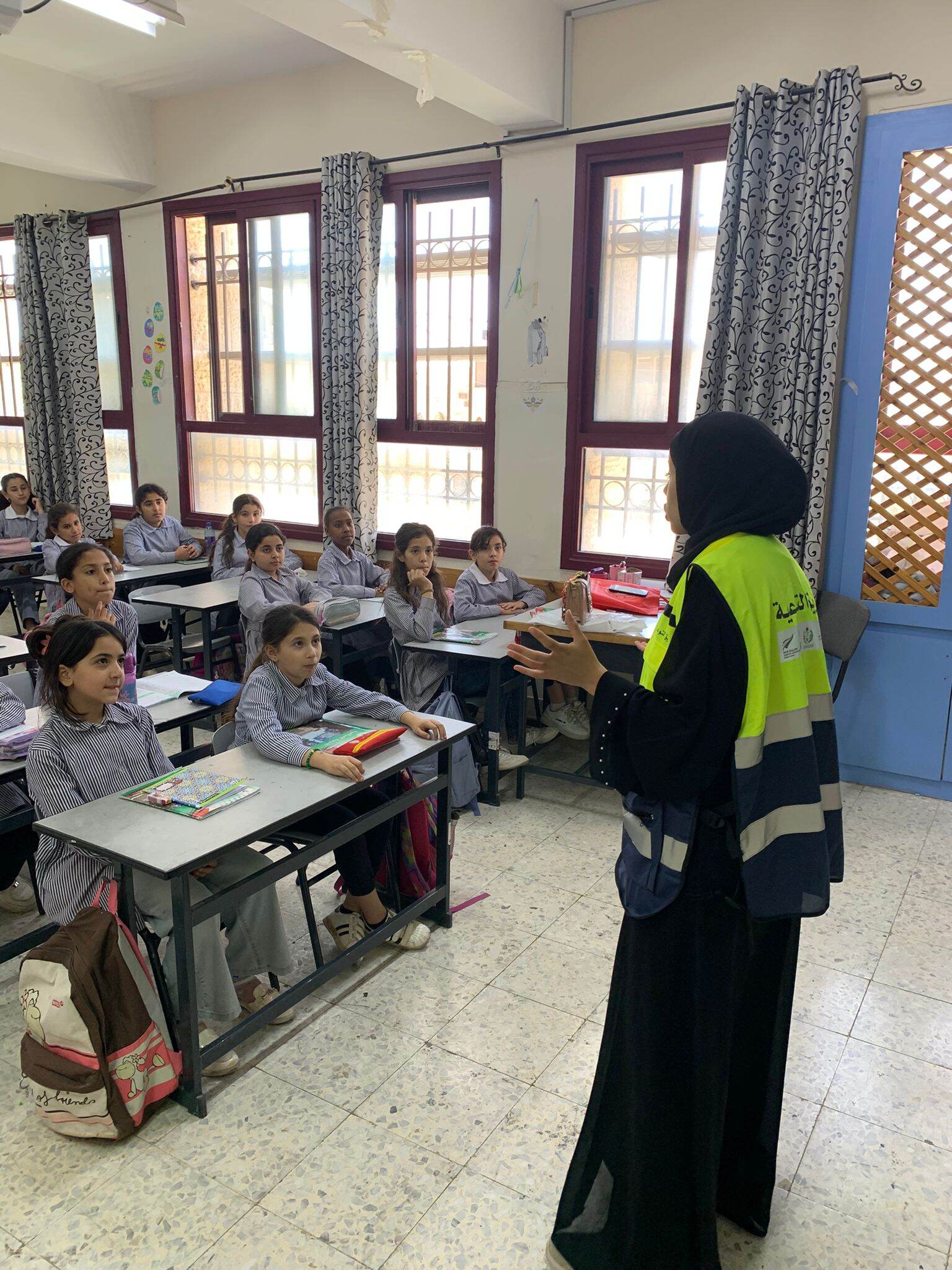 Schoolgirls in a classroom awareness session